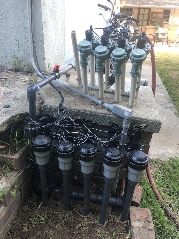 New irrigation piping and fittings installed in an open trench
